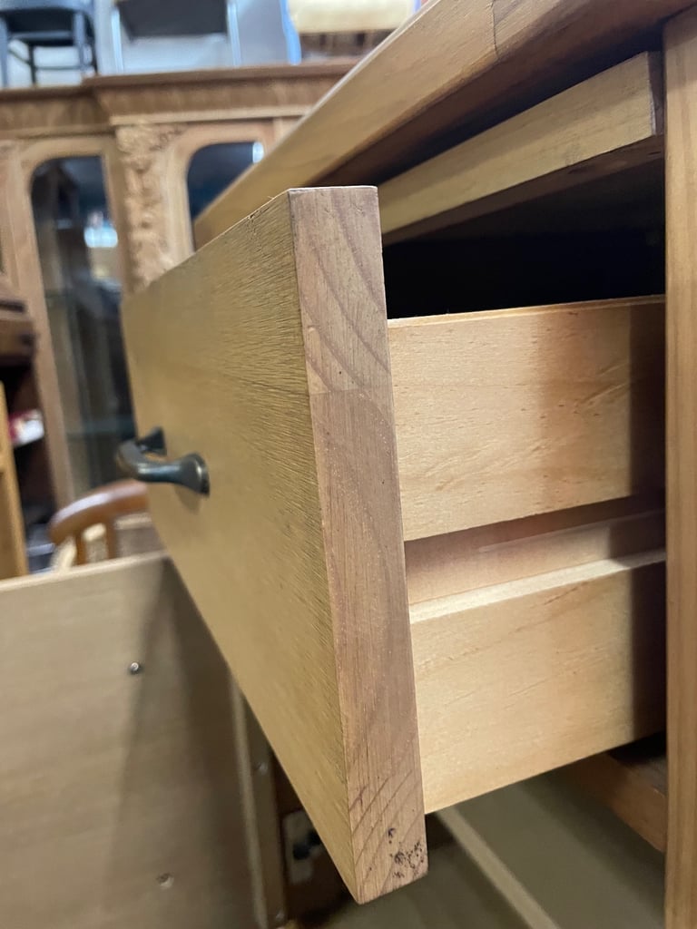 Two, solid wood bedside cabinets.