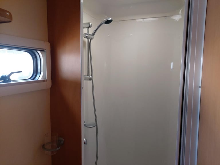 NOW SOLD 2010 Bailey Olympus 534 Fixed Bed End Washroom Caravan Motor Mover