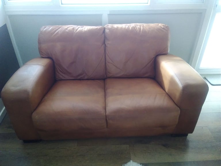 £20 two seater Buffalo Hide ( leather ) sofa with fire safety certificate 