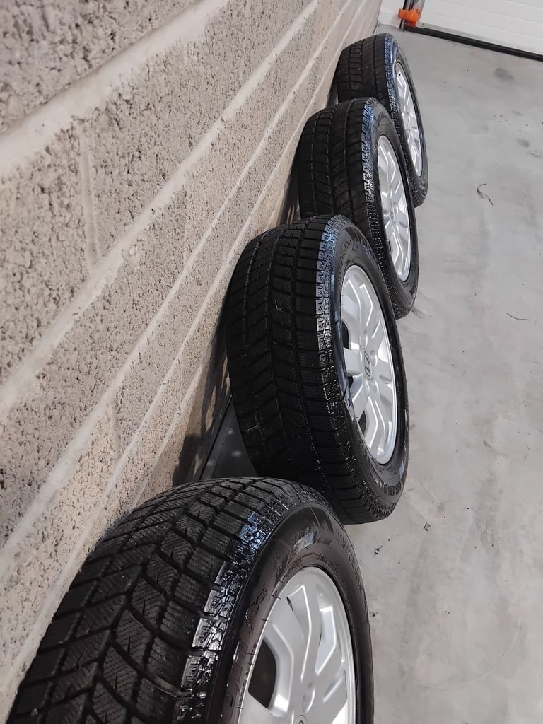 Genuine Honda CRV 16" Alloys with mud and snow tyres.