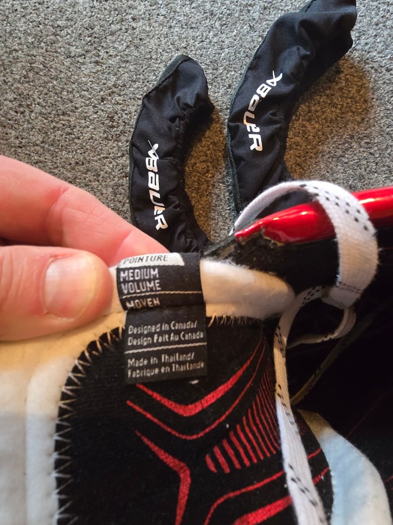 Bauer Ice Hockey Skates with Bauer covers, lace puller and bag.