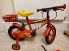Kids red Firechief training bike w stabilisers 