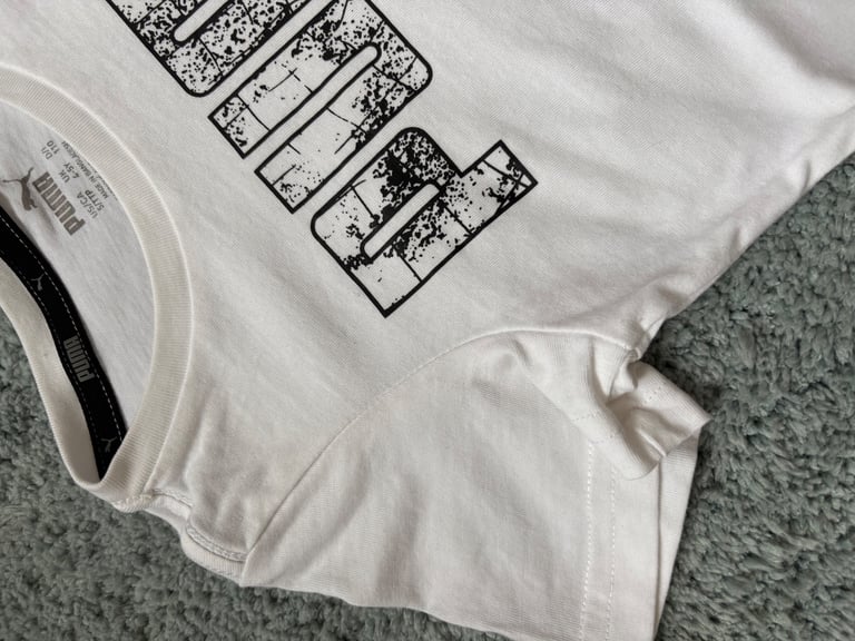 Puma T. Shirt and shorts set age 4-5 I’d say 3-4 yrs