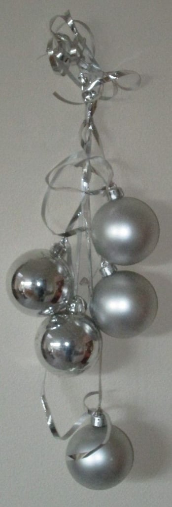CHRISTMAS DECORATION, 5 SILVER COLOURED BAUBLES TIED WITH SILVER RIBBON