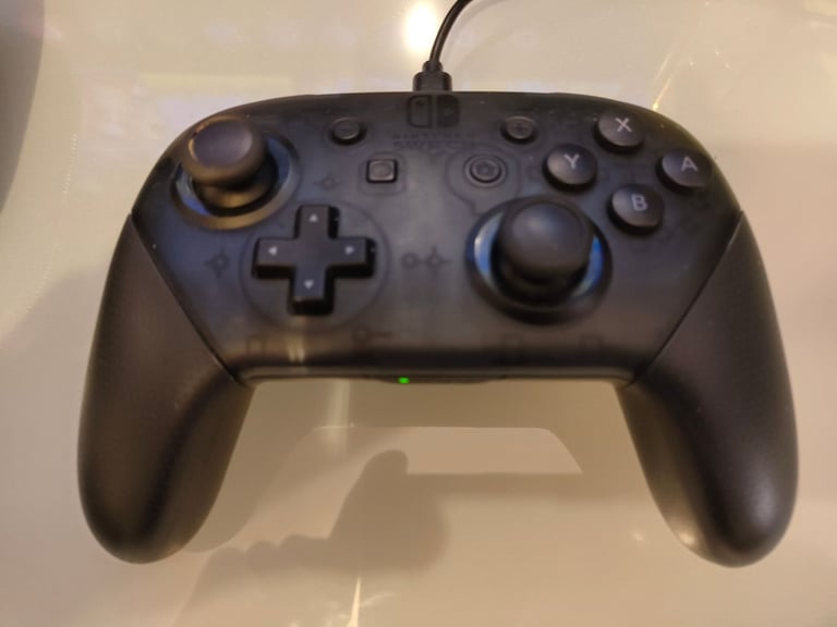 Nintendo Switch 32GB with Games and Pro Controller - Very Good Condition
