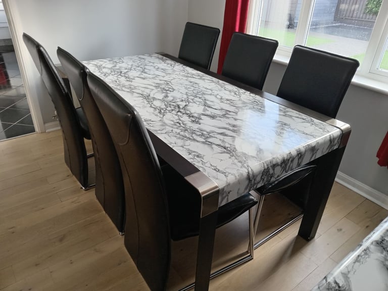 Black and white dining table and chair set and matching side board