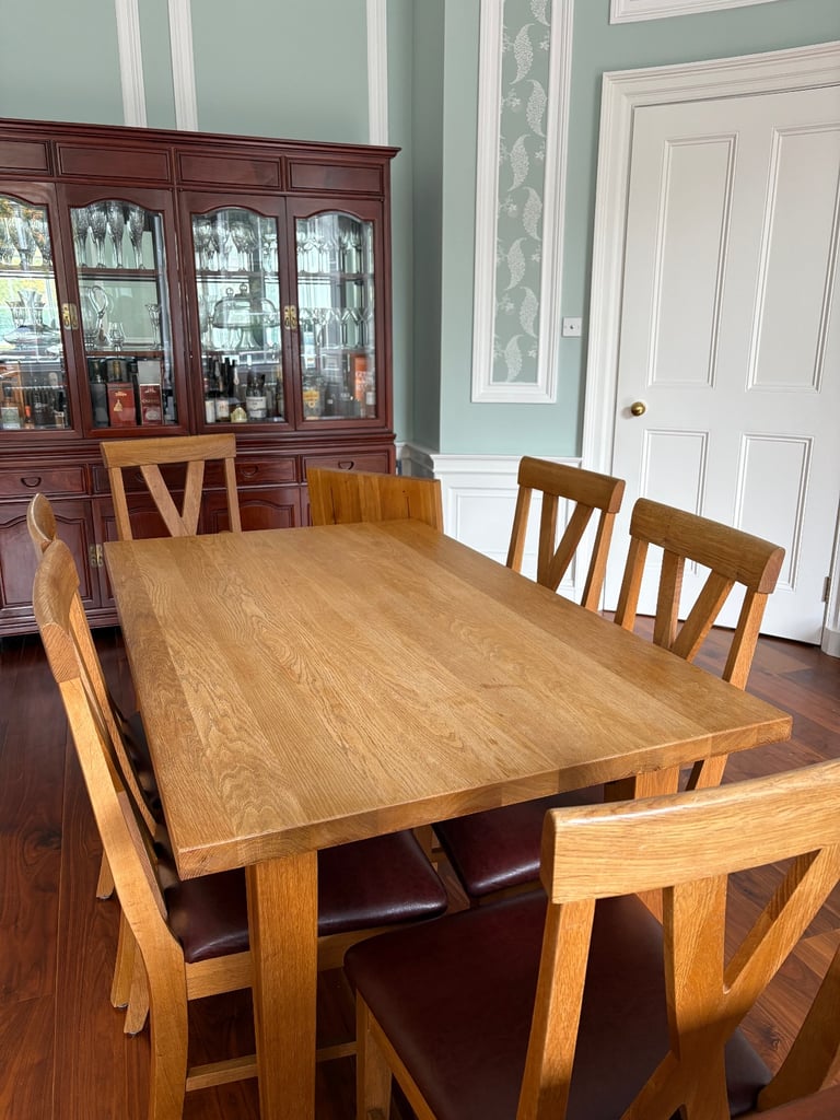 image for Solid oak dining table and chairs