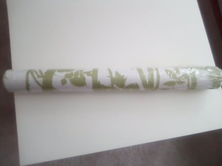 image for Roll of unused green/white patterned wallpaper - £2.