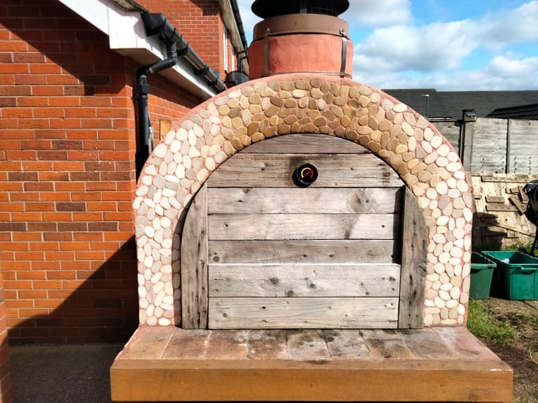 Big Hand Made Wood Fired Oven Outdoors.
