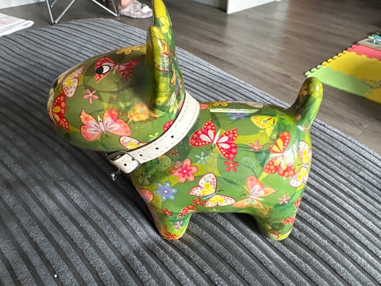 Pomme-pidon dog piggy bank 