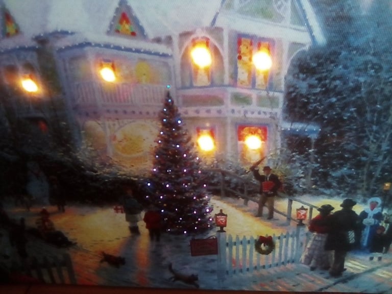 Attractive battery operated Christmas canvas picture plaque, with inset flickering lights.