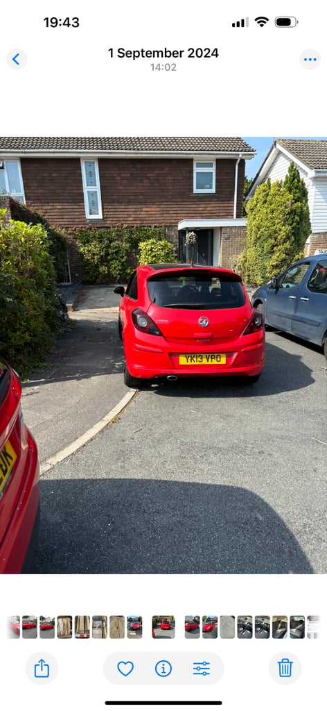 Red vauxhall corsa 