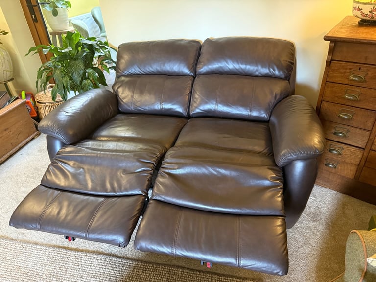Leather two seater reclining sofa