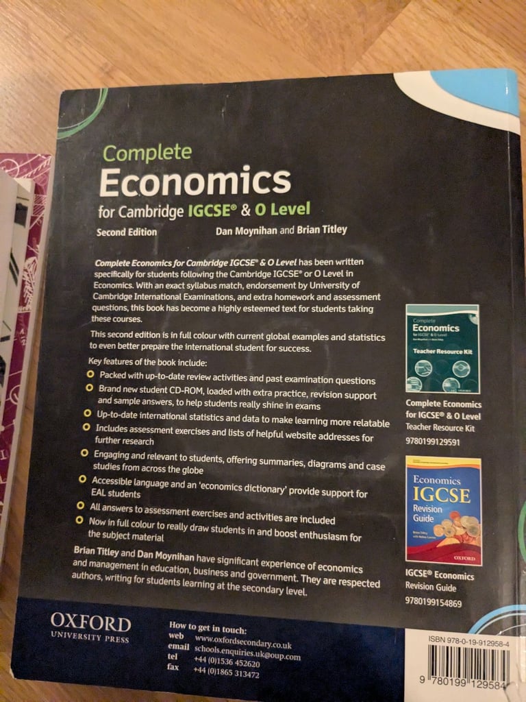 IGCSE economics book with CD - unused