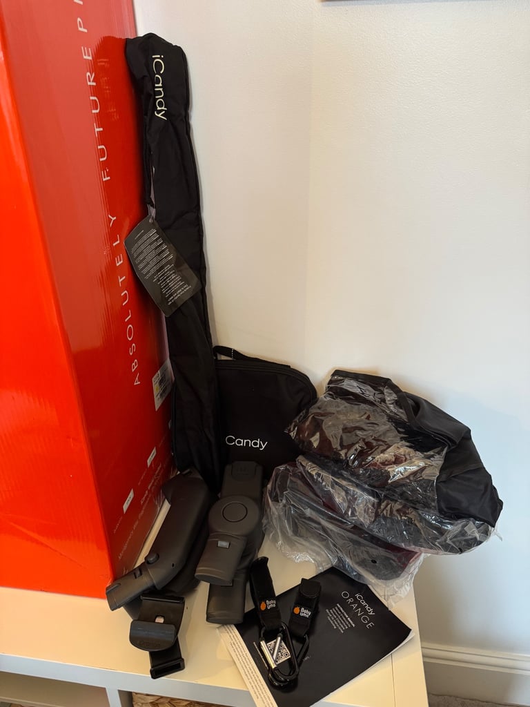 Icandy orange pushchair & carrycot with accessories