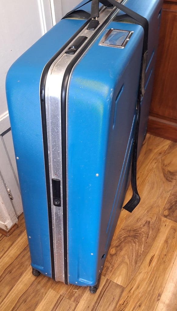 Hard wheeled case for transporting a bicycle eg to take on a plane journey. 