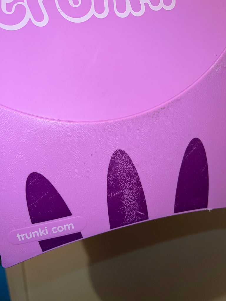 Used kids Purple Trunki Ride on 