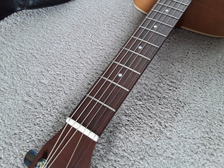 Left handed Norman B18 acoustic guitar, made in canada.