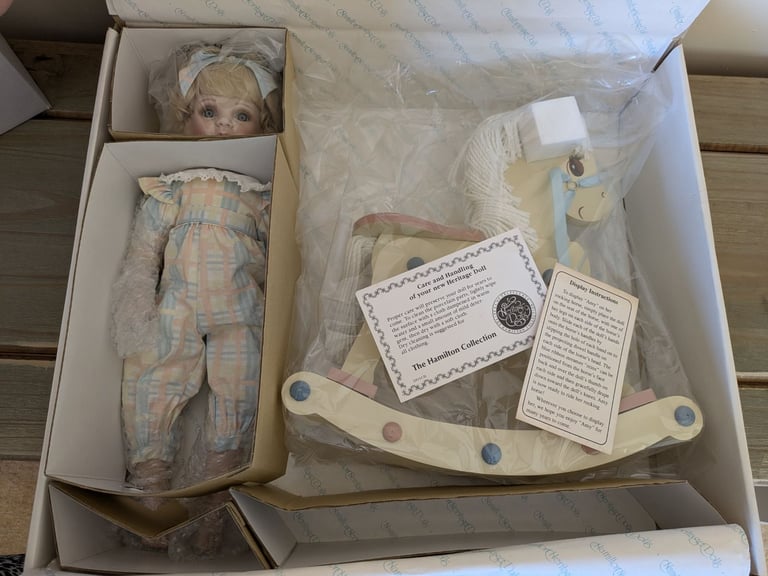 Collection of immaculate porcelein dolls 