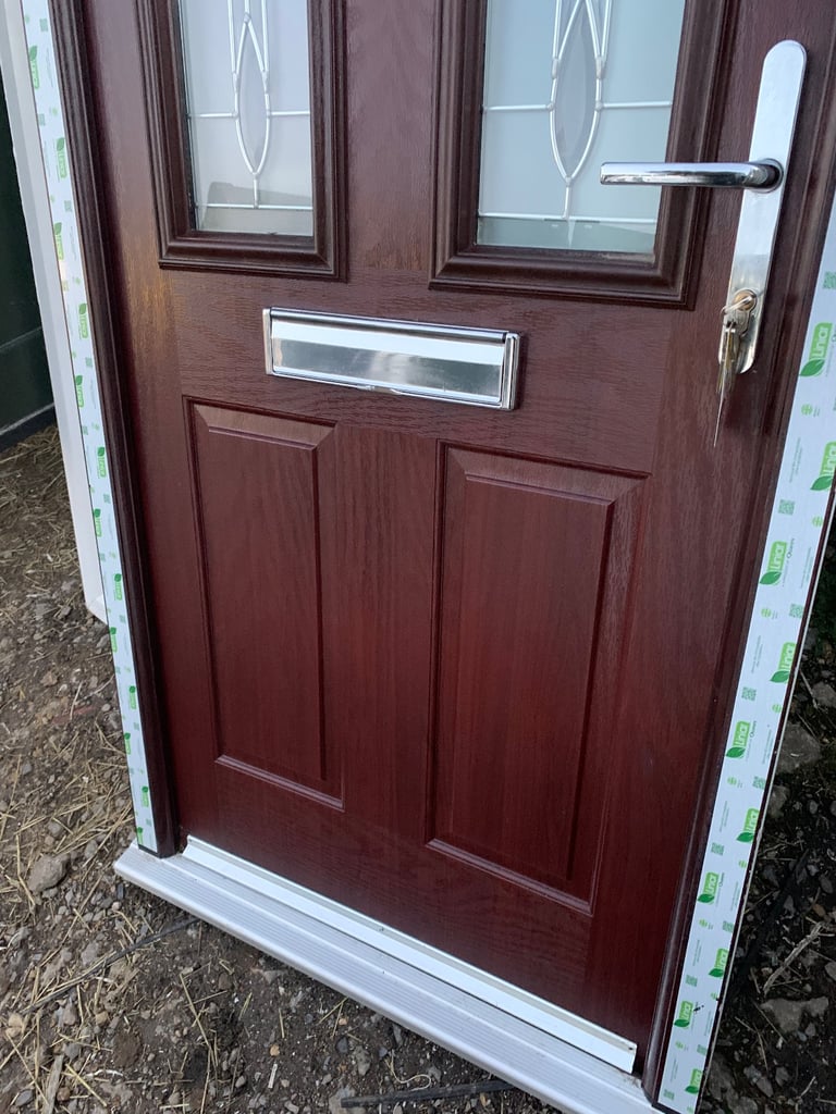 Brand new composite front door with high security locks Free local delivery 