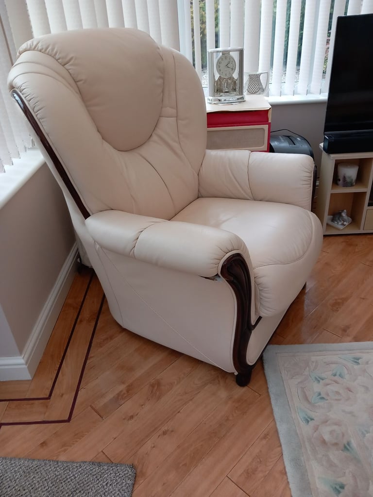 Leather armchair and footstool