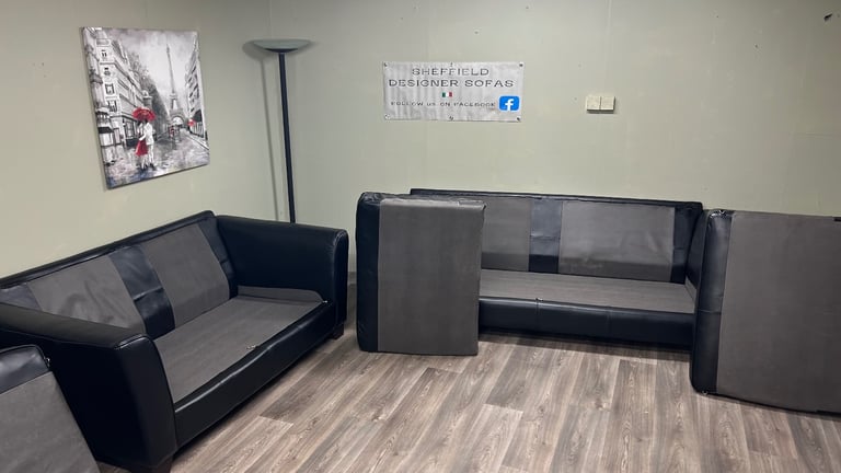 Black leather sofas 3&2