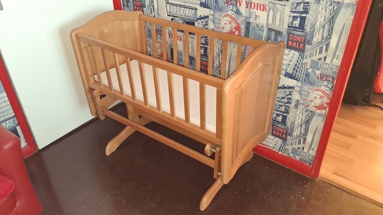 Wooden rocker cot