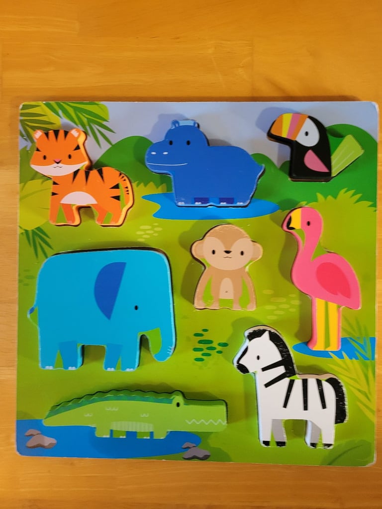 image for Kids jungle animal wooden shape puzzle. Good condition.