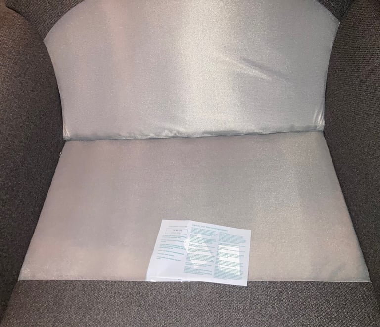 Grey cuddle chair, like new, can deliver locally 