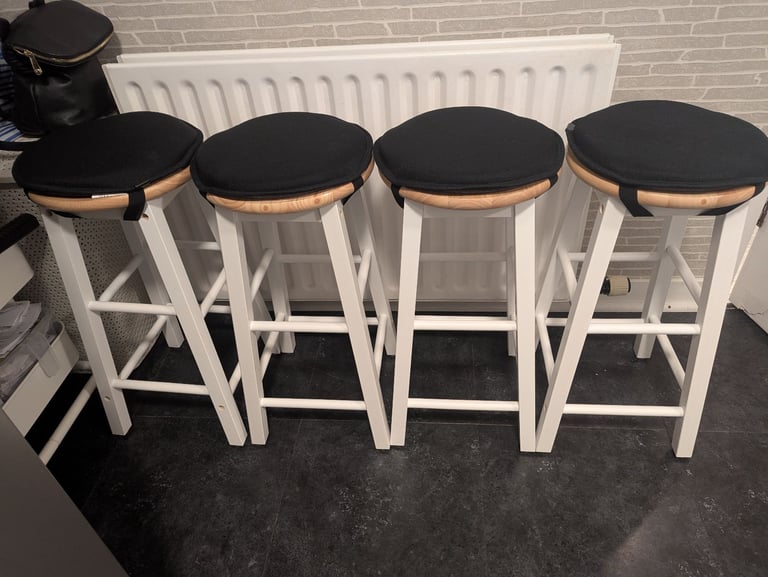 Habitat 4 as new wooden stools with clip of seatpads 