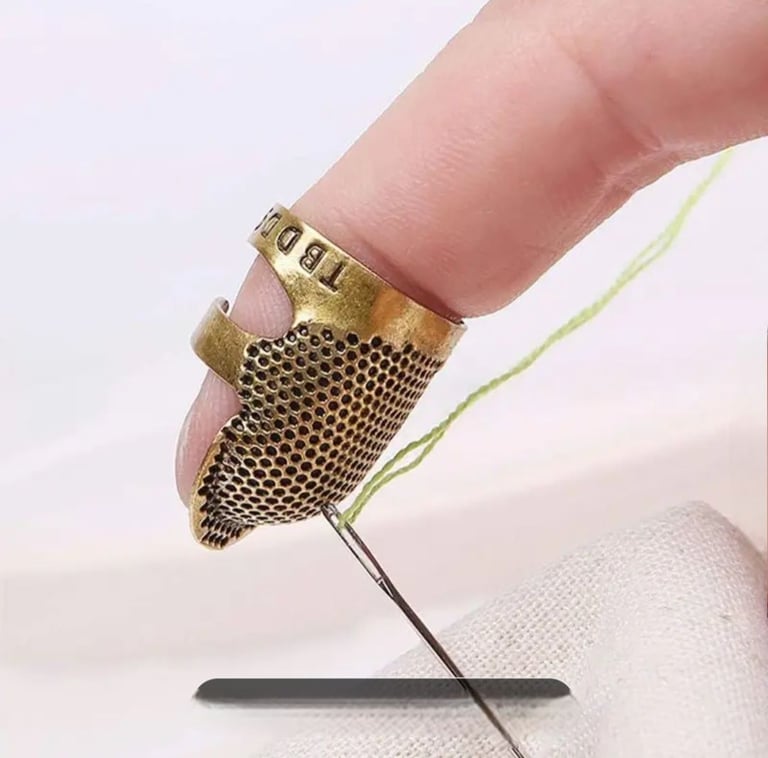 Metal needle finger guard 