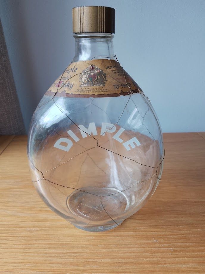 Dimple whiskey bottle
