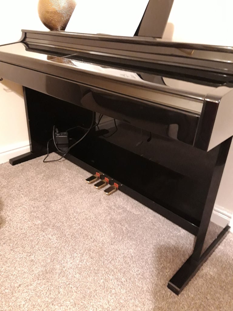 Piano Concert Electric with high glossy black lacquer finish. 