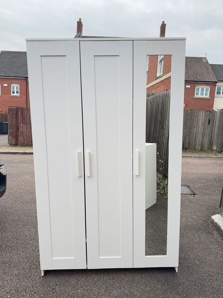 IKEA BRIMNES 3-Door Wardrobe with Hanging Rail and Shelves.