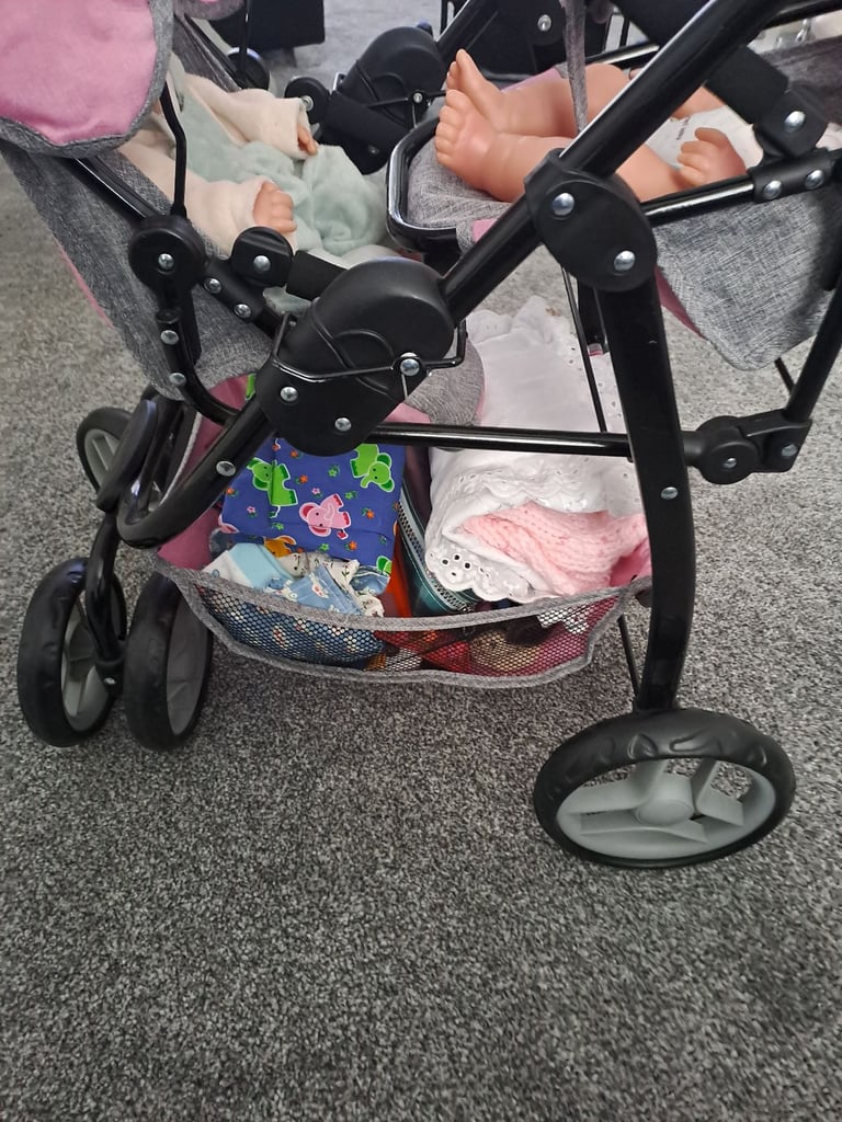 Childrens twin buggies with twin dolls 