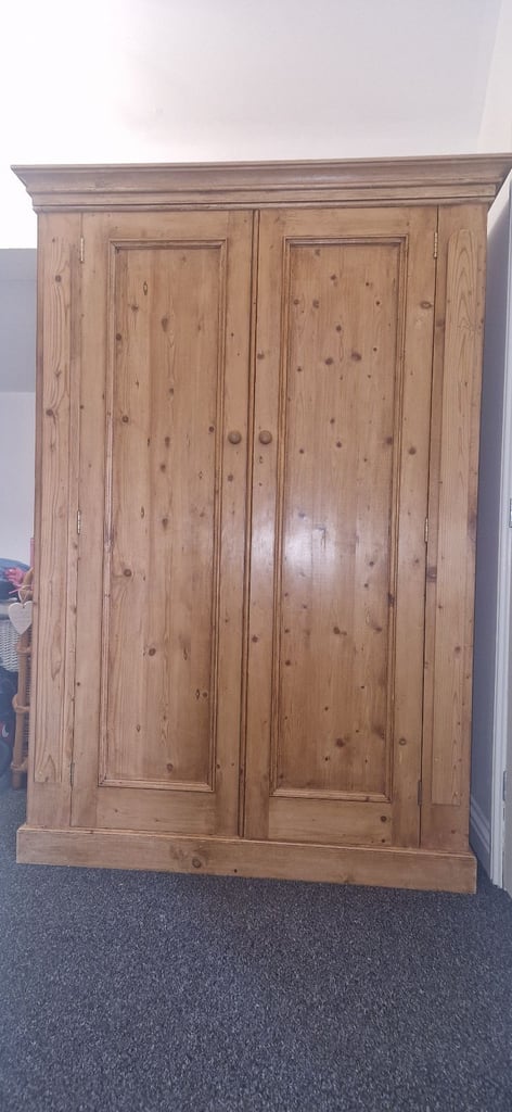 Solid pine wardrobe, draw and bed side table.