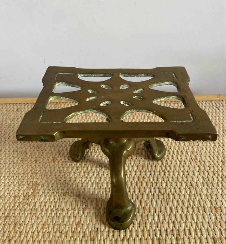 Antique, solid brass Fireside trivet 