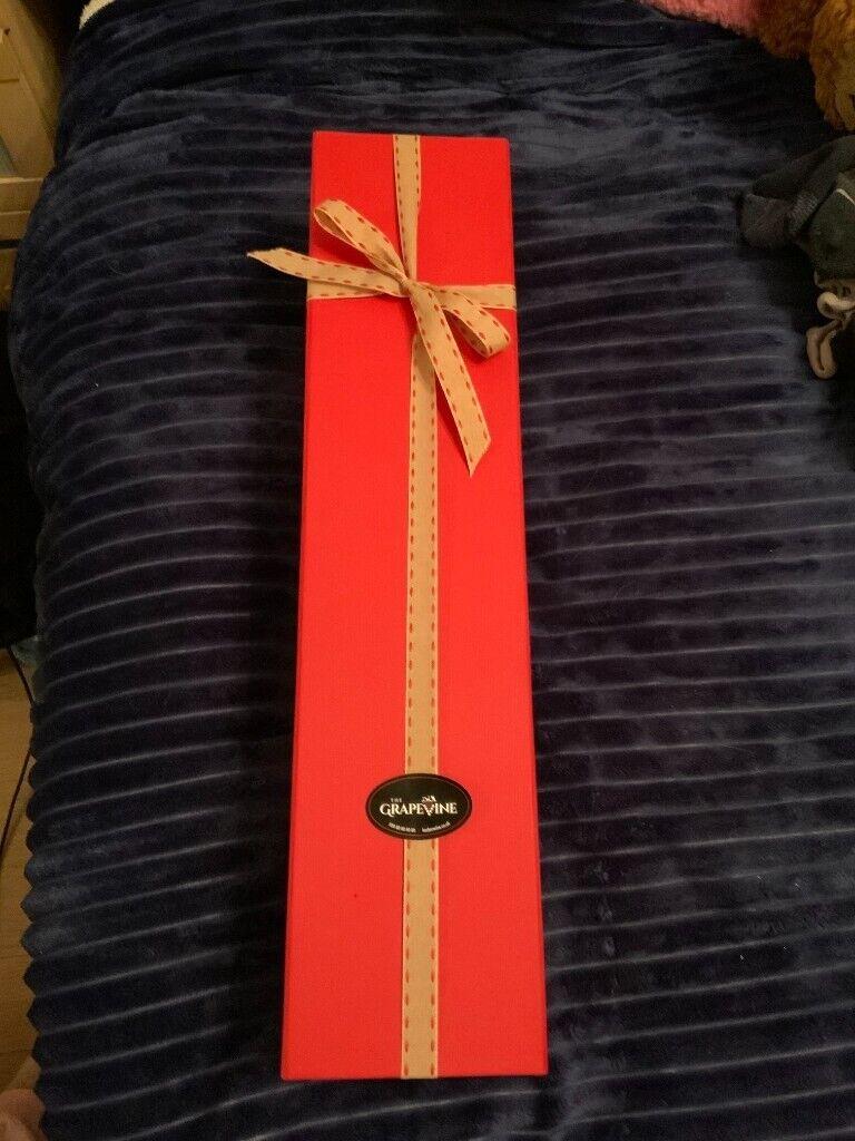 Gift box for wine bottle and chocolates 