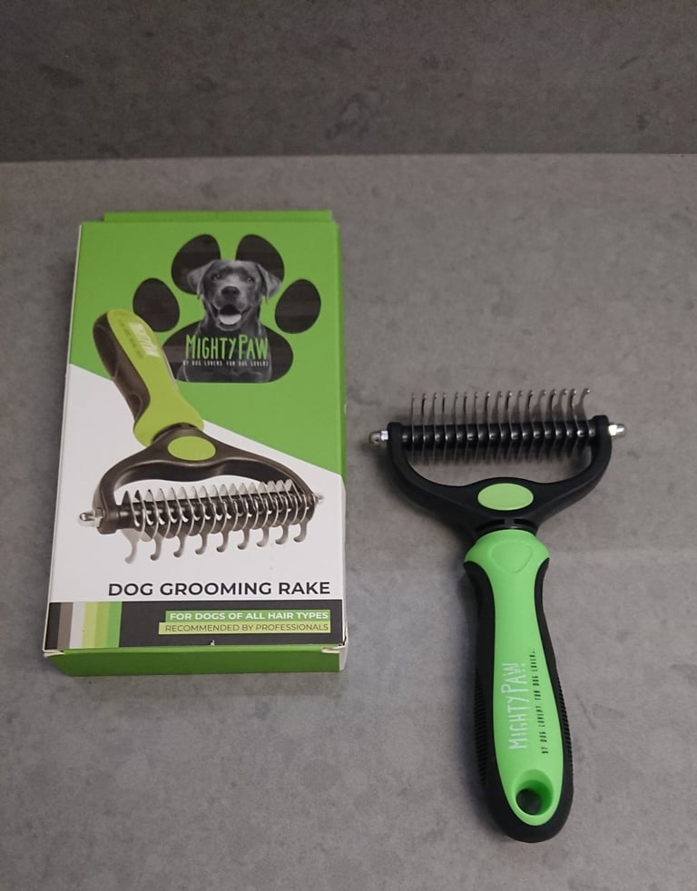Dog grooming rake .new boxed 
