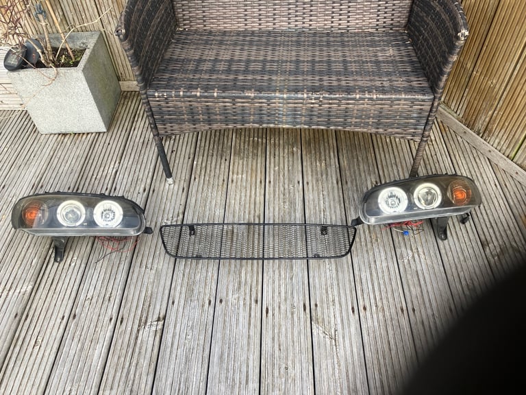 Omega headlights
