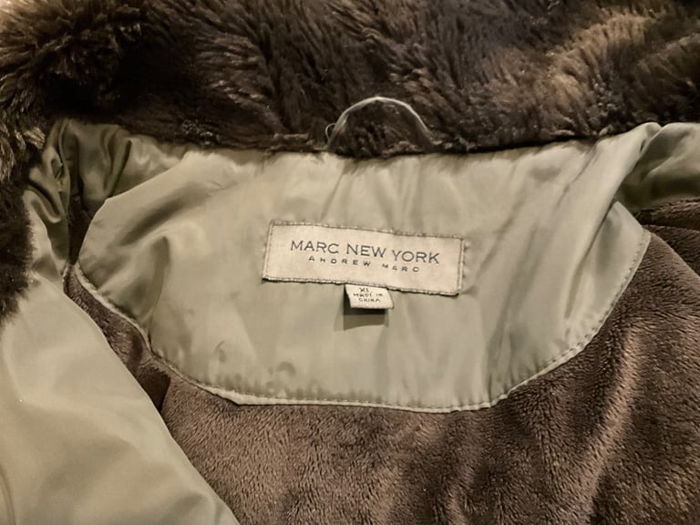 ANDREW MARK OF NEW YORK ladies coat size XL about 24 inches pit-pit when flat.