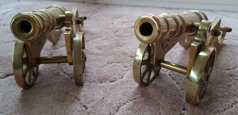 Vintage pair of large brass cannons