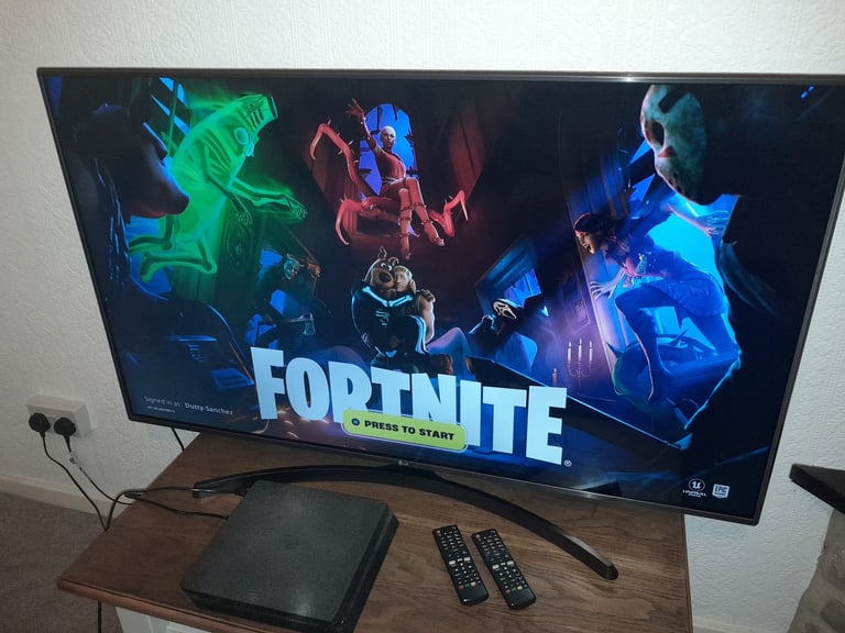 LG 55 inch 4K Ultra HD HDR Smart LED TV with two remotes