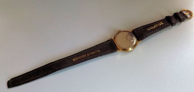 VINTAGE TIMEX QUARTZ WATCH WITH GOOD QUALITY BROWN LEATHER STRAP G.W.O.