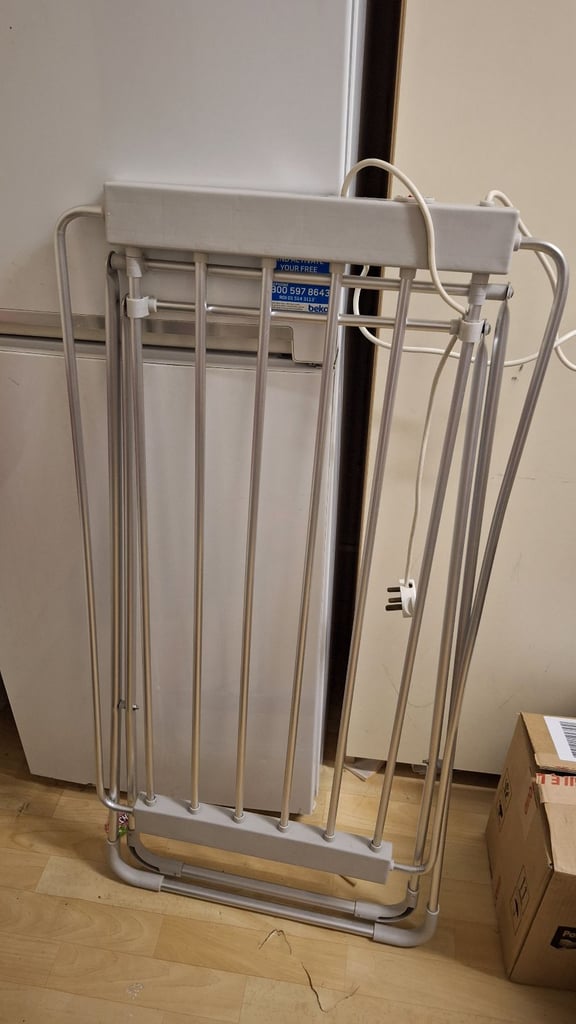 Electric cloths drying stand 