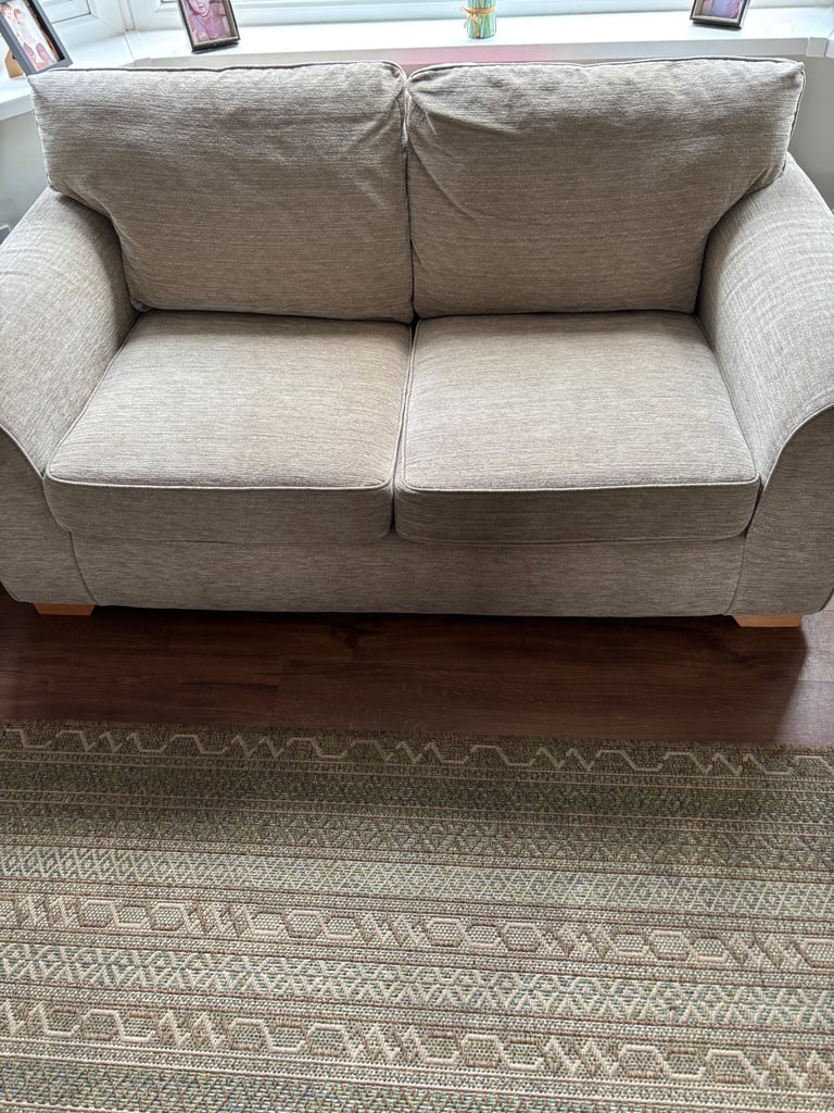 Beige sofa bed.