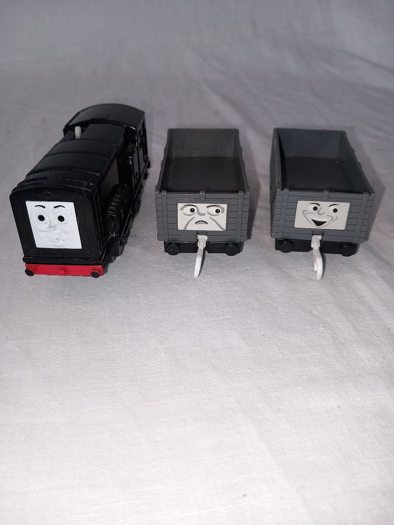 Thomas Tank Engine. Train Diesel with 2 troublesome trucks.
