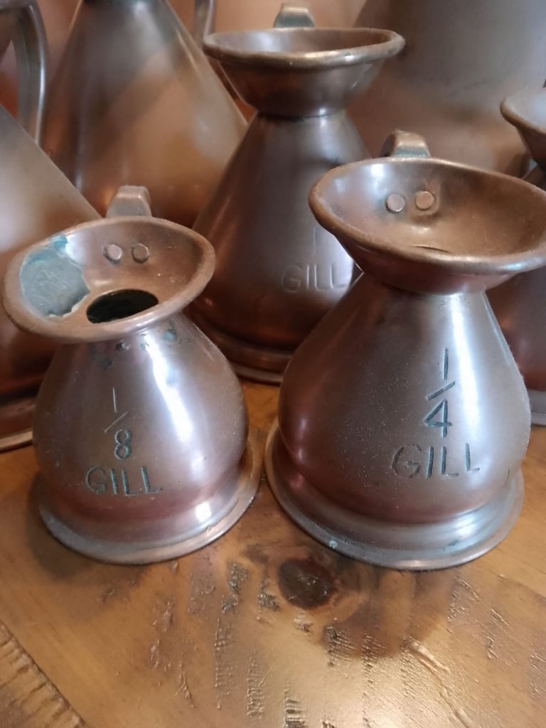 Vintage copper brass measure jug collection