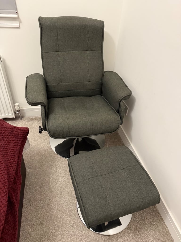 image for Grey Swivel chair with matching foot stool