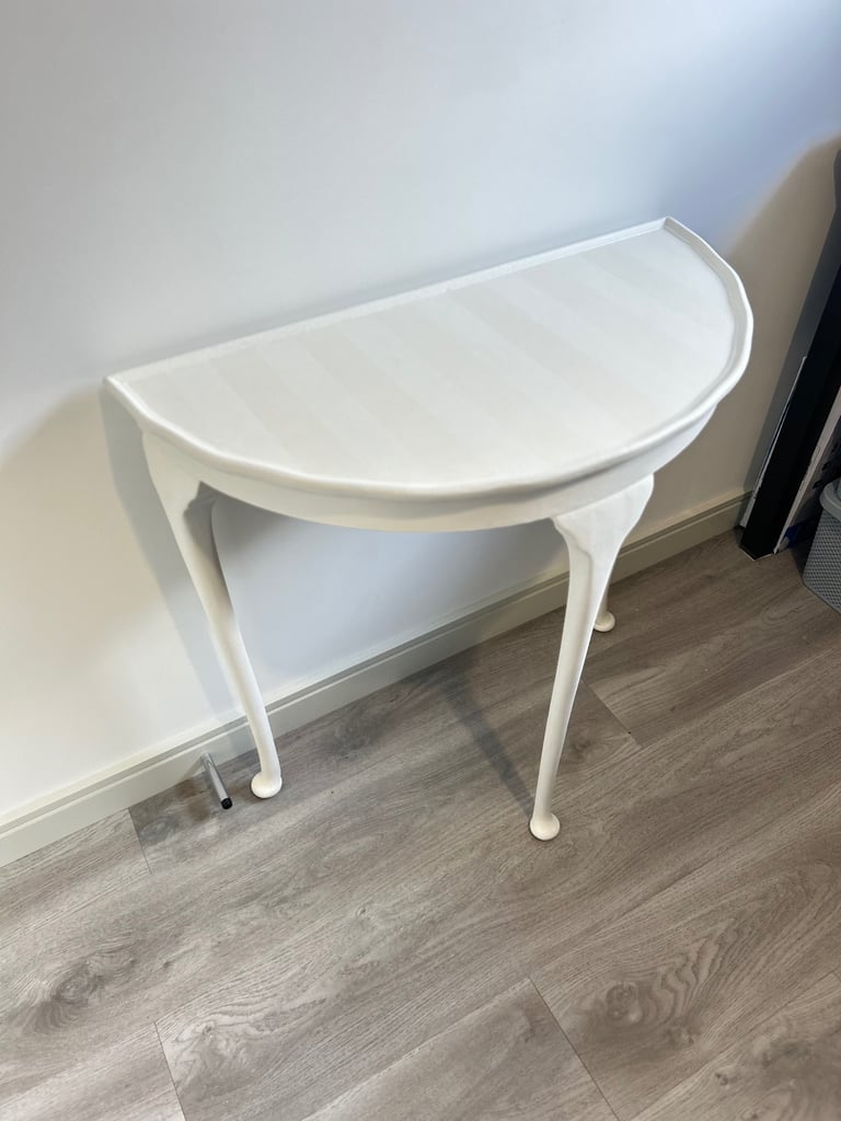 Elegant refinished hall table with ghost stripes